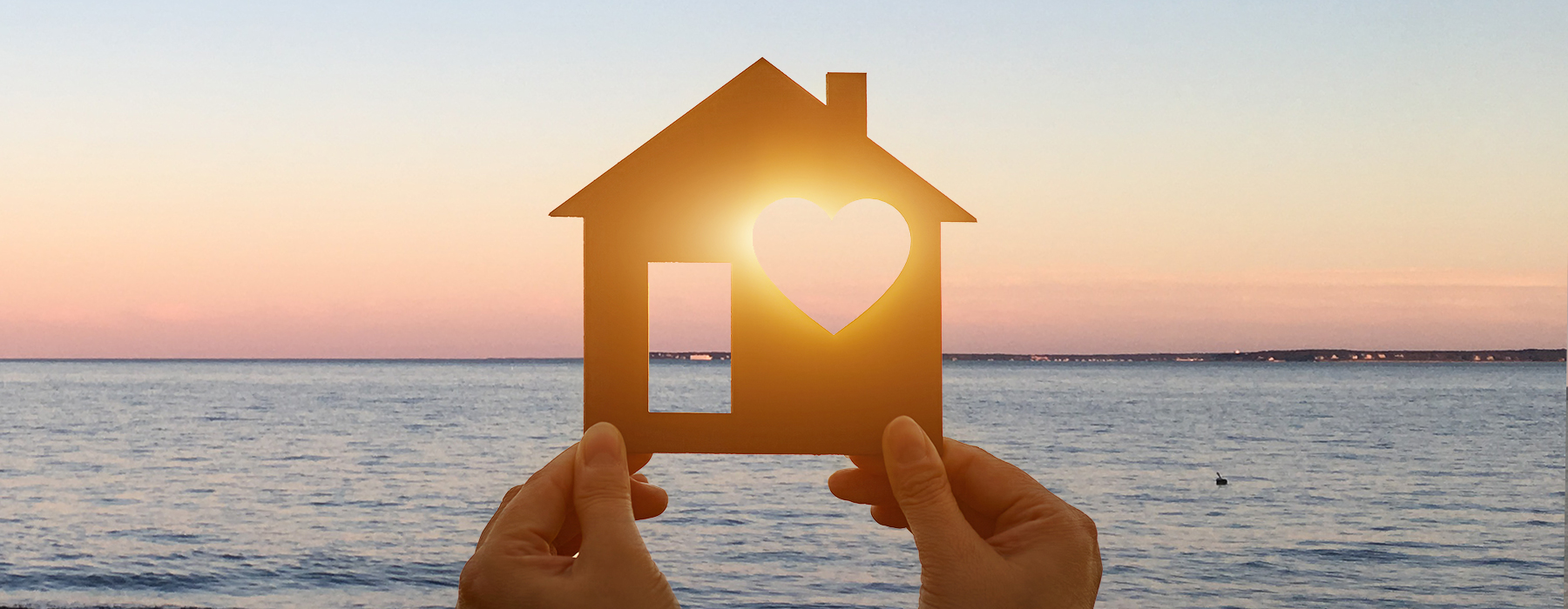 banner hands holding house cutout