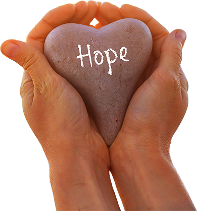hands holding heart shape rock